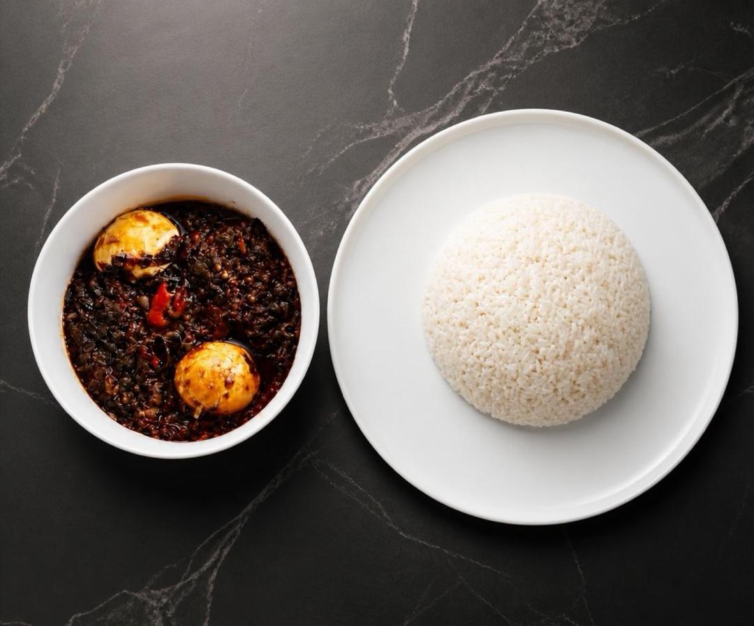 Beans, boiled egg and rice served together