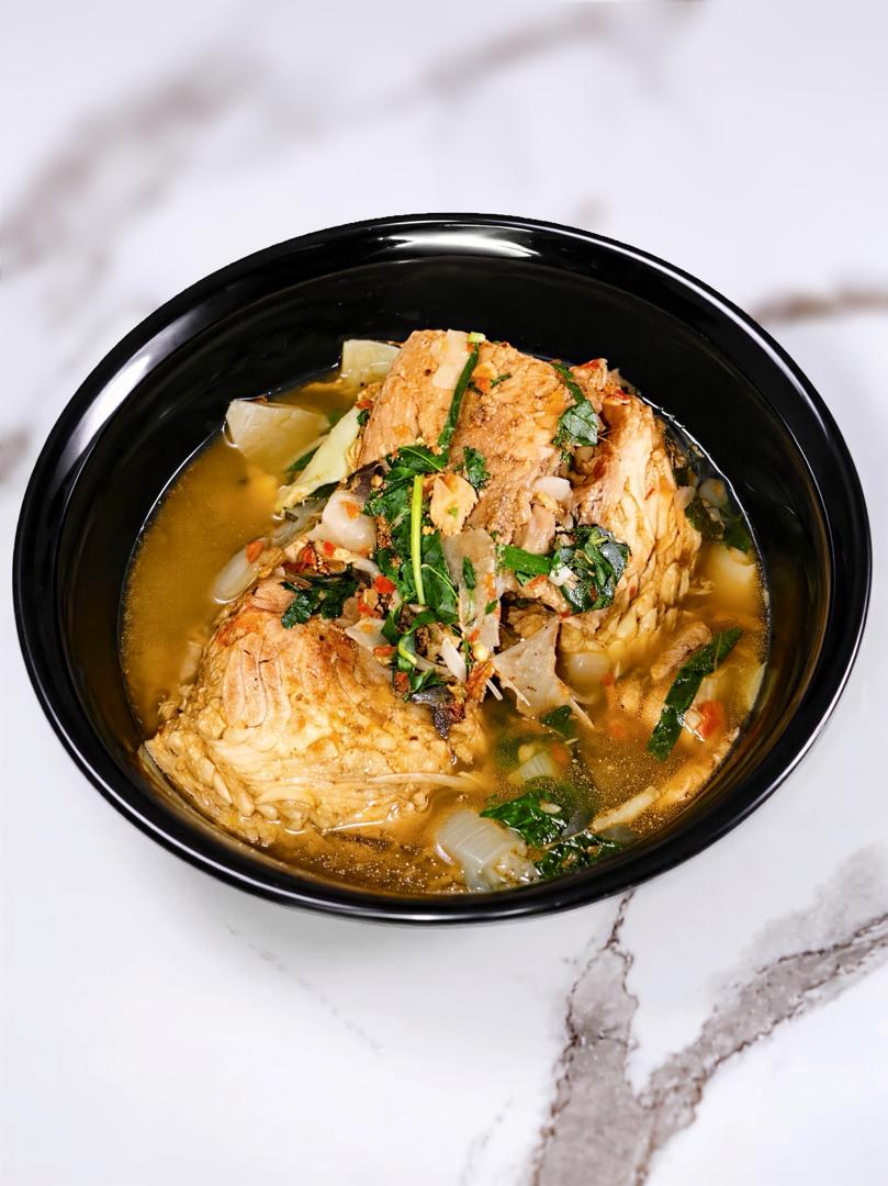 Chicken soup with vegetables and herbs