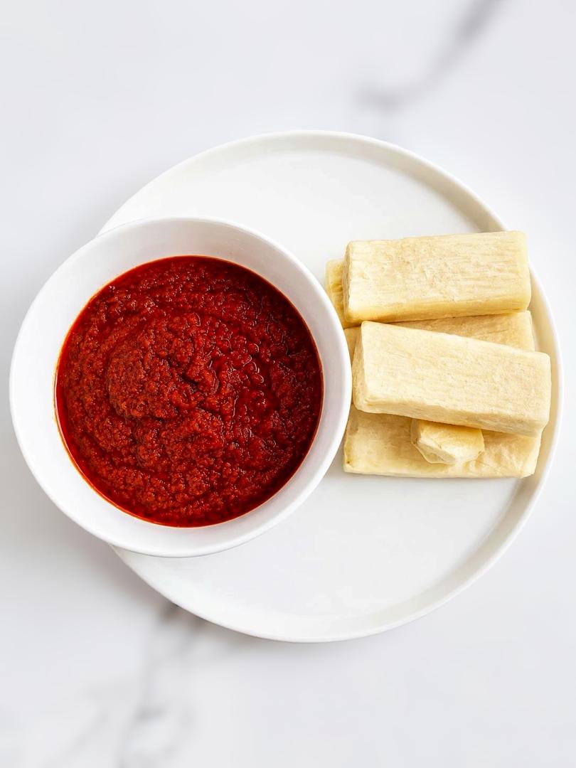 Rich pepper sauce served with soft rolls